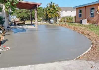 a freshly poured concrete driveway