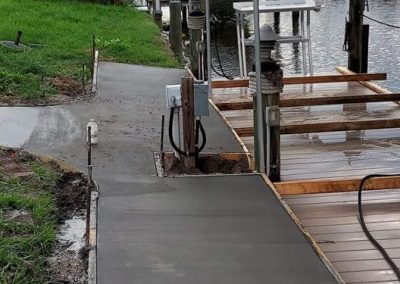 a concrete sidewalk being poured
