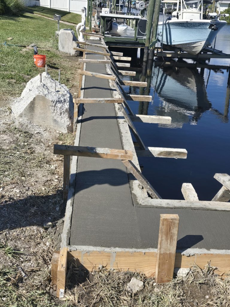 Sea wall cap poured on the canal in El Jobean, FL by El Jobean bridge.