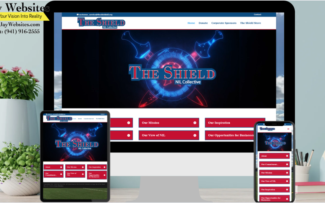A desktop, tablet, and smartphone display the same website, The Shield NL Collective, on a desk with office supplies. ;part of a website strategy, design & SEO system
