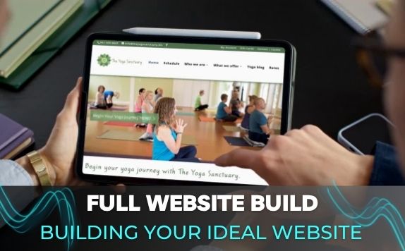 Person viewing a yoga studio website on a tablet with the text Full Website Build: Building Your Ideal Website overlaid. ;part of a website strategy, design & SEO system